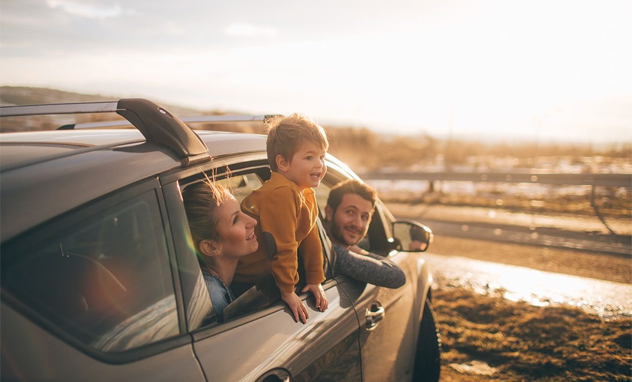 Family travelling by car